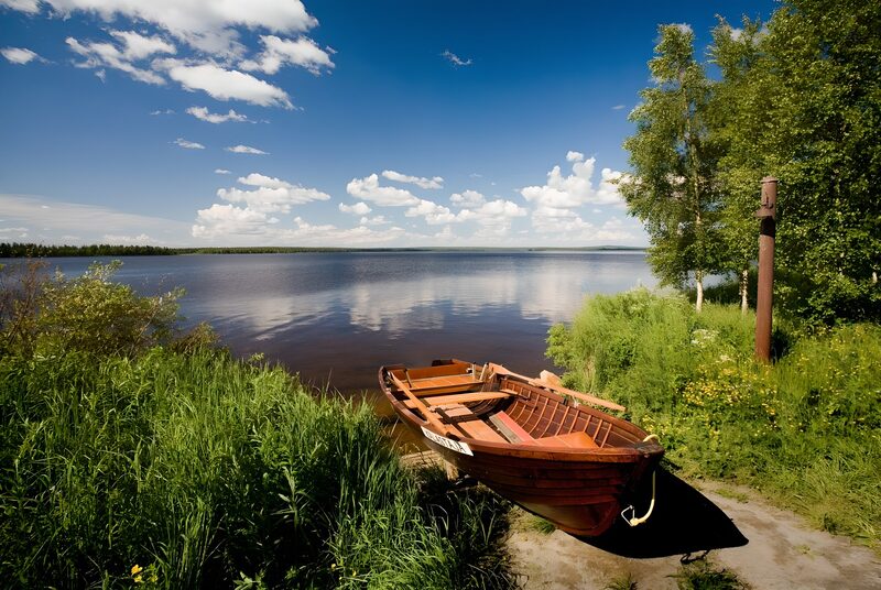 Serene Lakeside Scene with a Boat