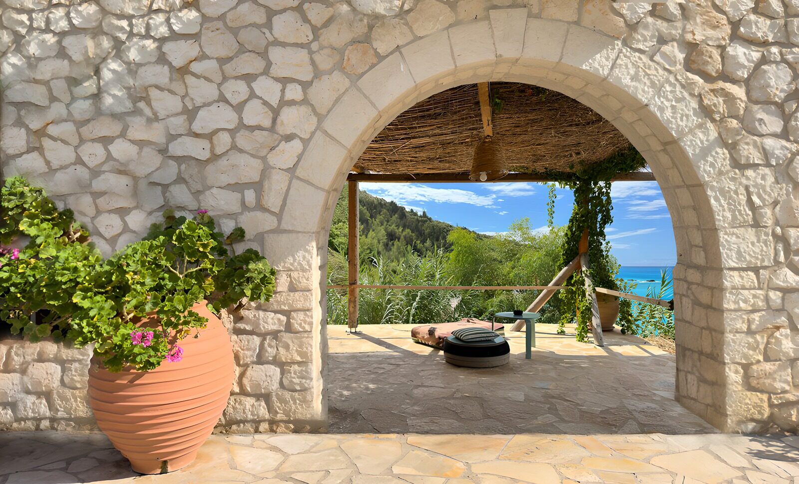 Serene Coastal View Through Stone Archway