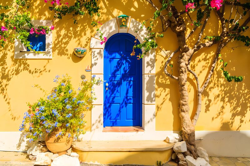 Vibrant Blue Door with Floral Accents