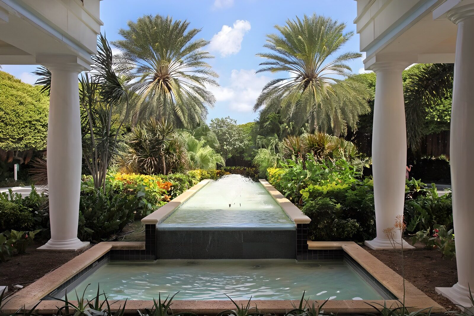 Tropical Oasis with Flowing Water Feature