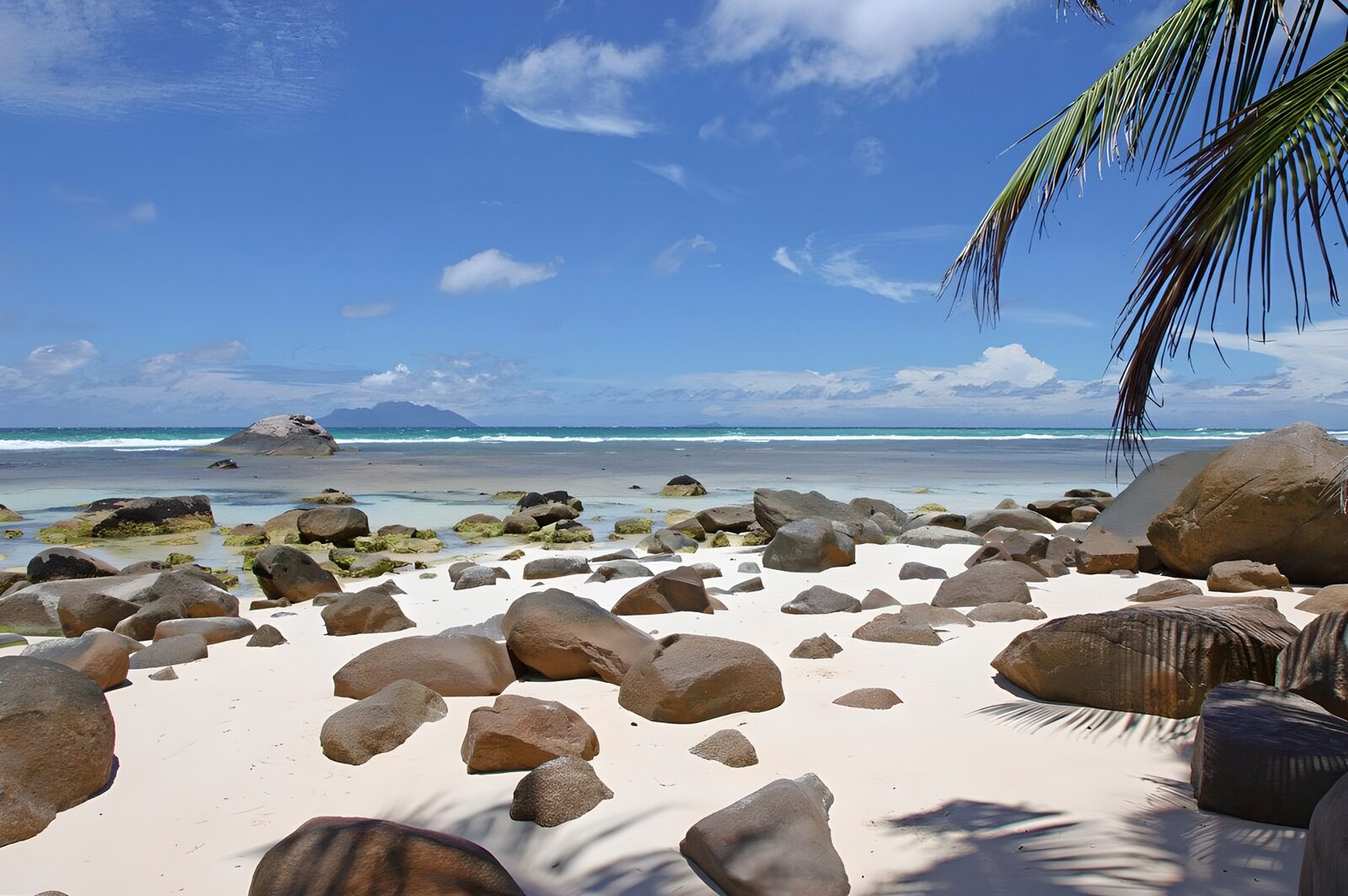 Serene Beach with Rocky Shoreline