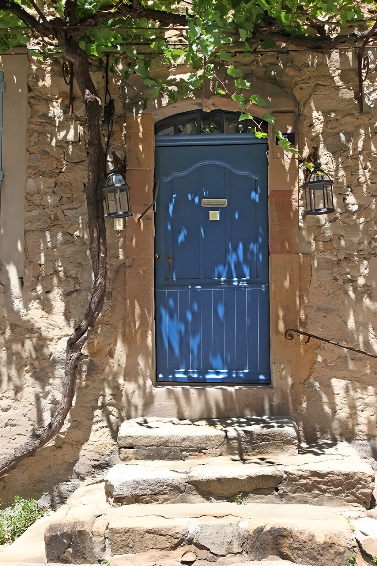 Charming Blue Doorway in Stone Wall