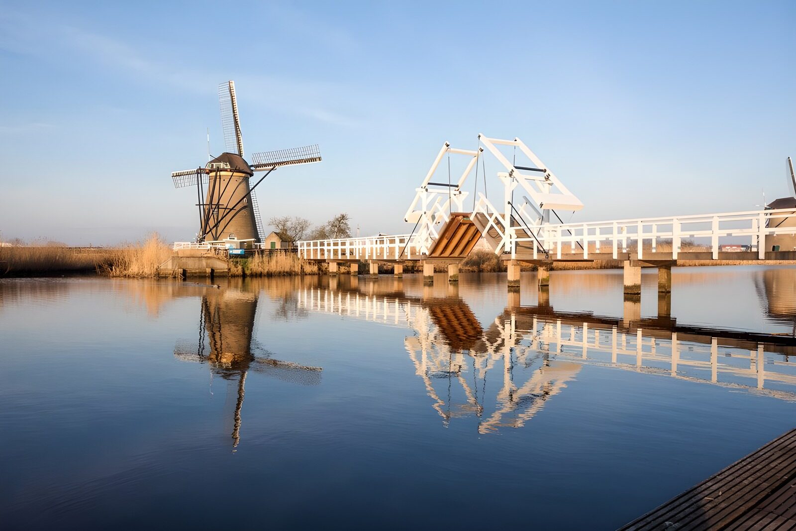 Charming Dutch Windmill and Bridge Reflection