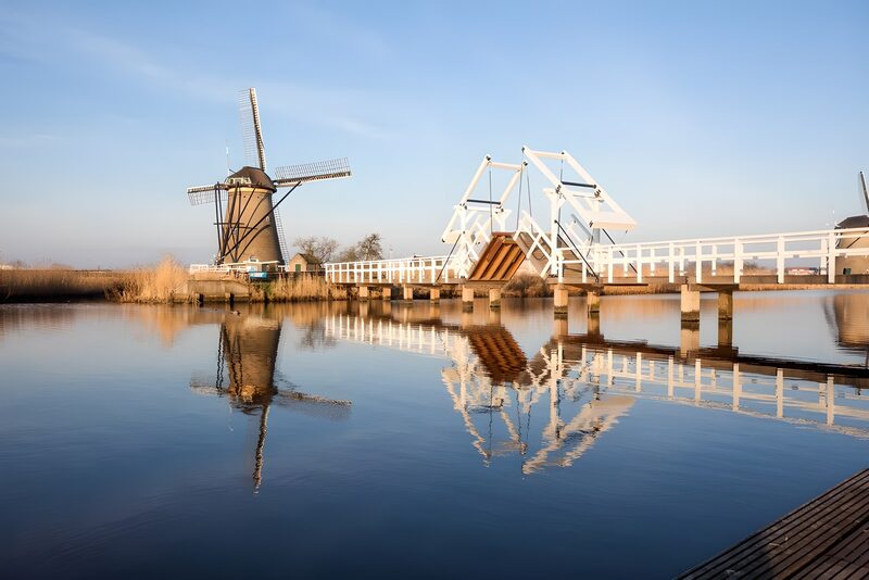 Charming Dutch Windmill and Bridge Reflection