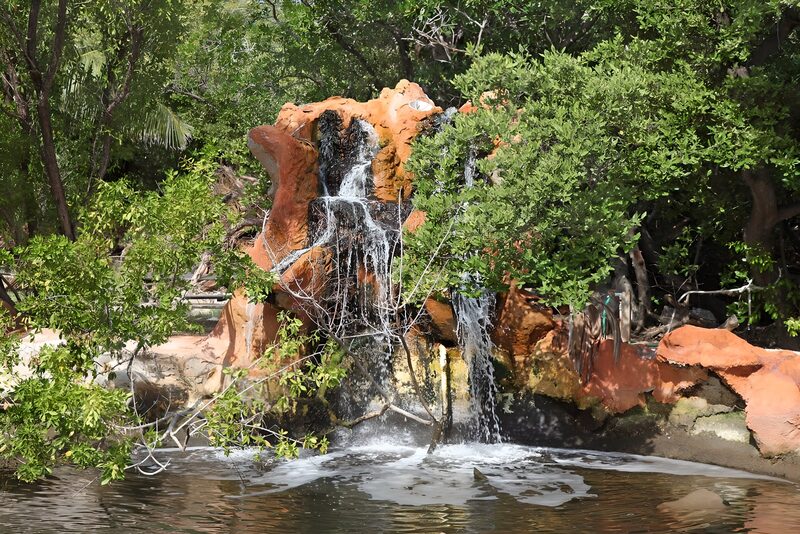 Tranquil Waterfall in Lush Greenery