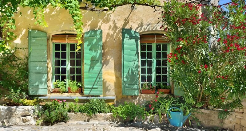 Charming Green Shuttered Windows
