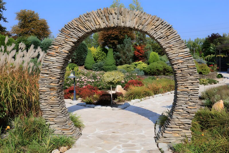 Serene Stone Archway in a Colorful Garden