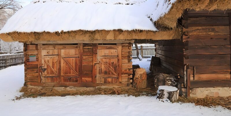Rustic Winter Barn in Snow