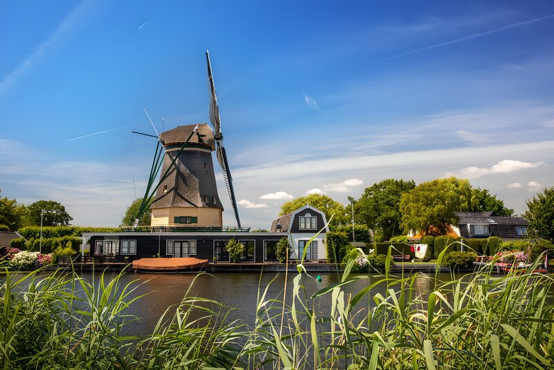 Charming Dutch Windmill by the Water