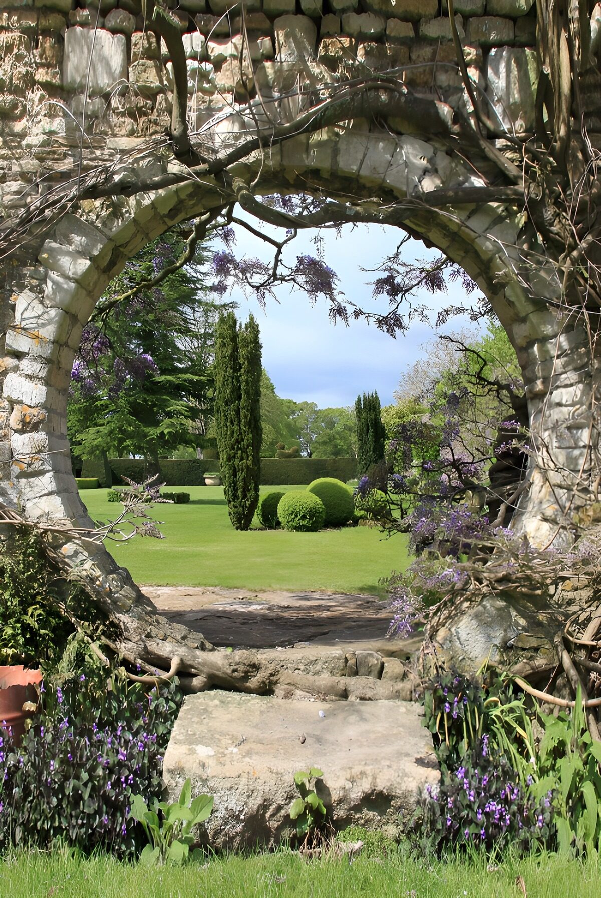Serene Garden Through Stone Archway