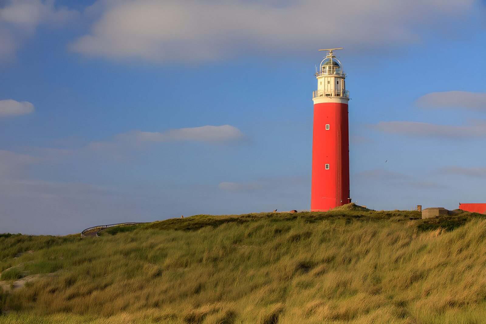 Majestic Red Lighthouse by the Sea