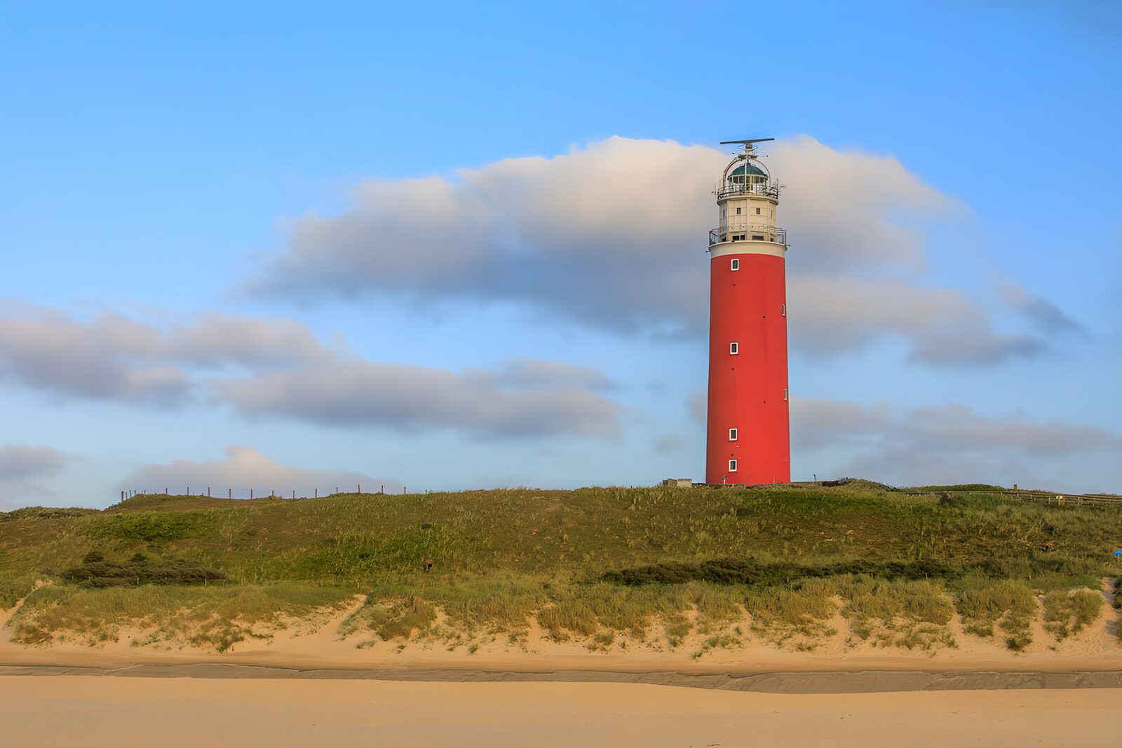 Majestic Red Lighthouse by the Sea