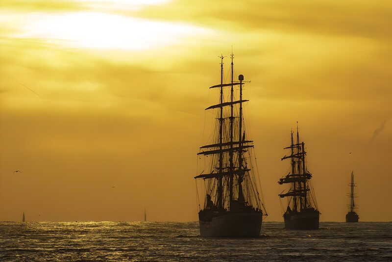 Majestic Tall Ships at Sunset