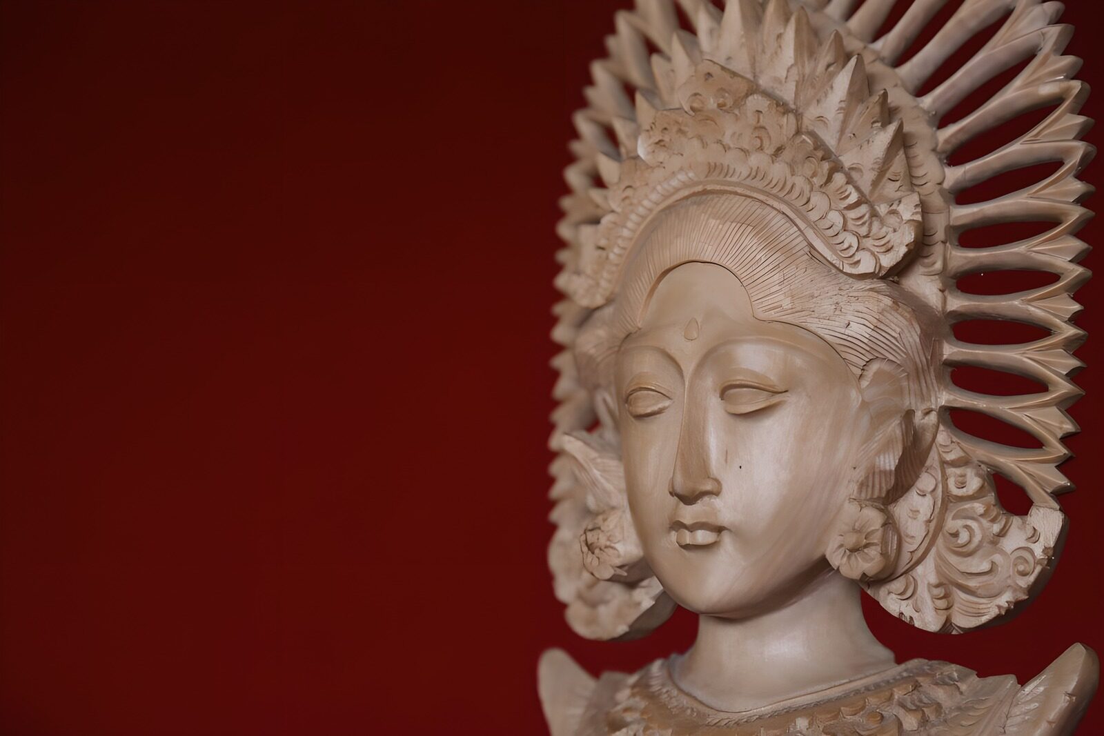 Elegant Wooden Sculpture of a Deity