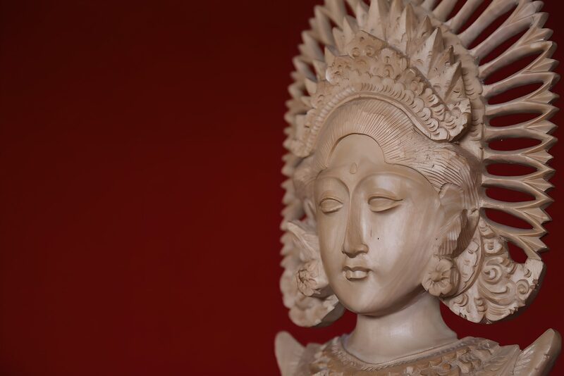 Elegant Wooden Sculpture of a Deity