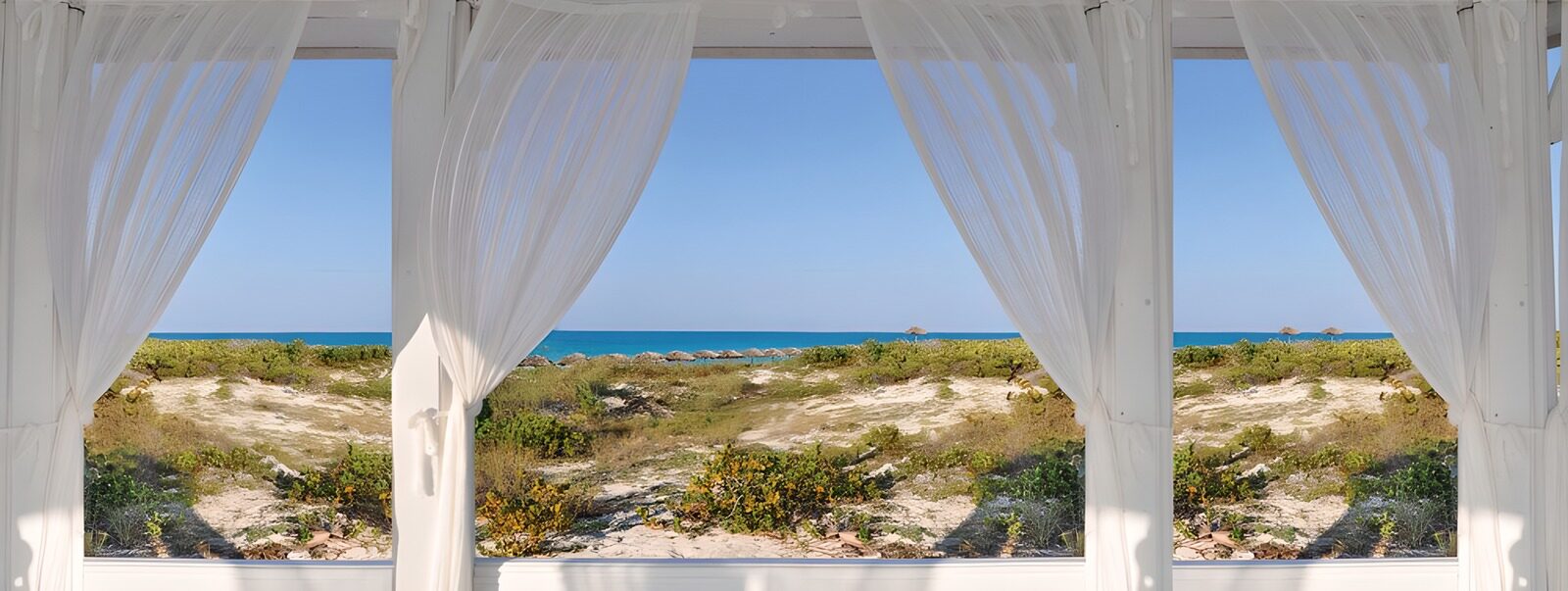 Ocean View Through White Curtains