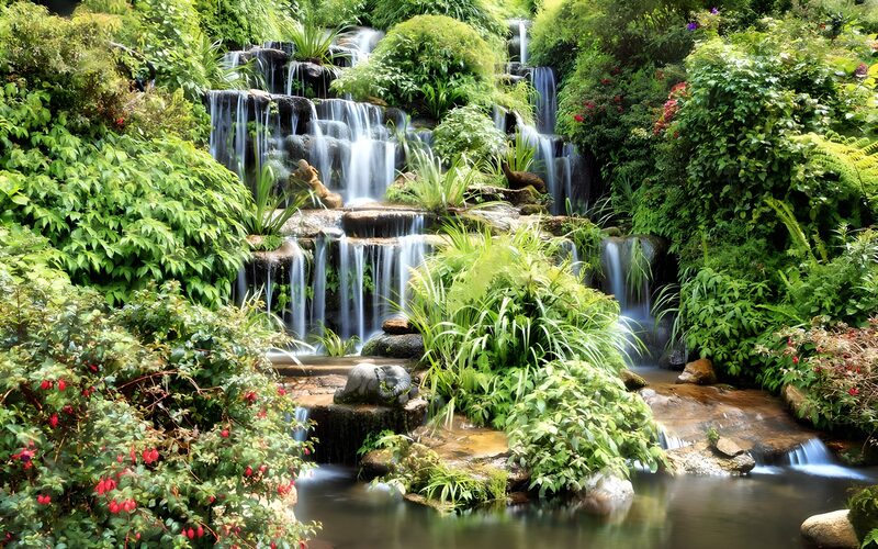 Serene Waterfall in Lush Garden