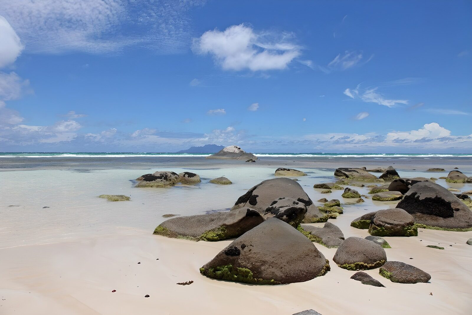 Serene Beach with Rocky Outcrops