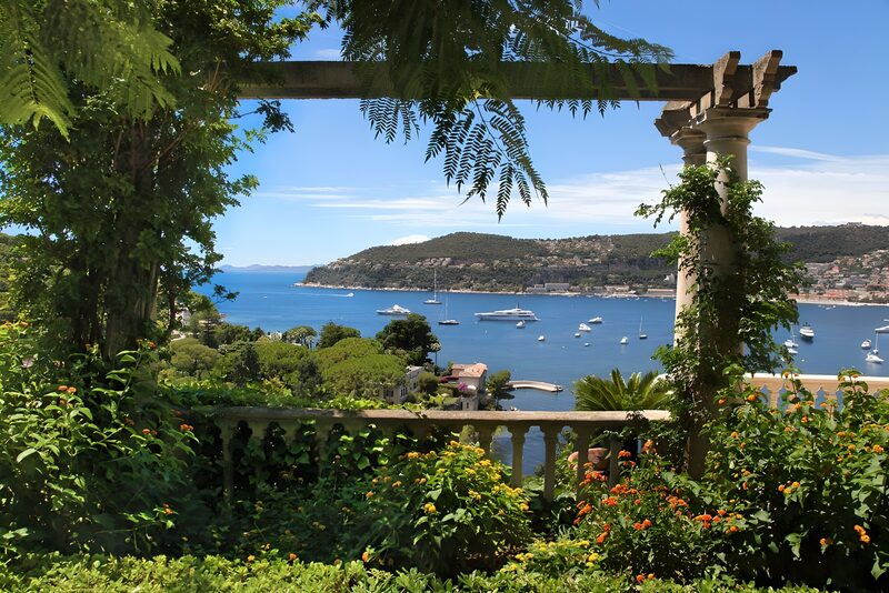 Serene Coastal View from a Garden