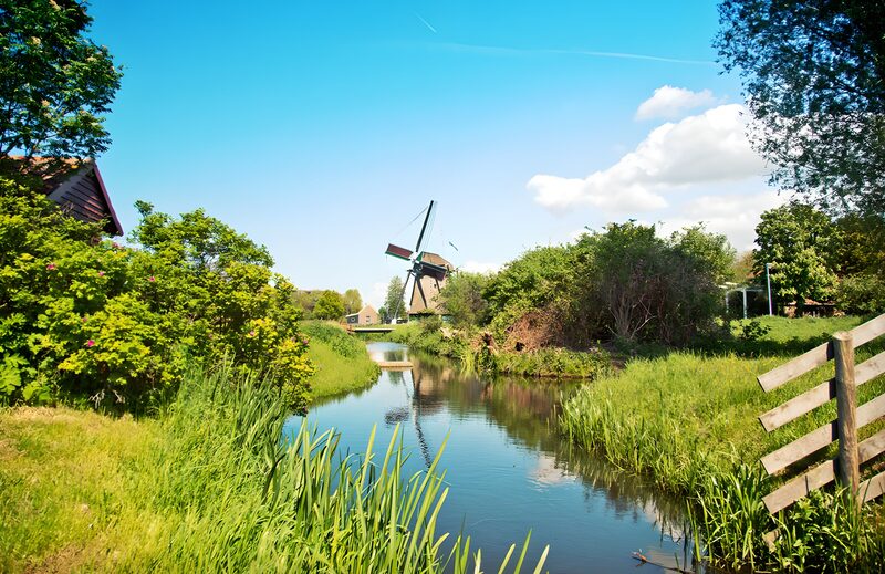Tranquil Dutch Countryside with Windmill