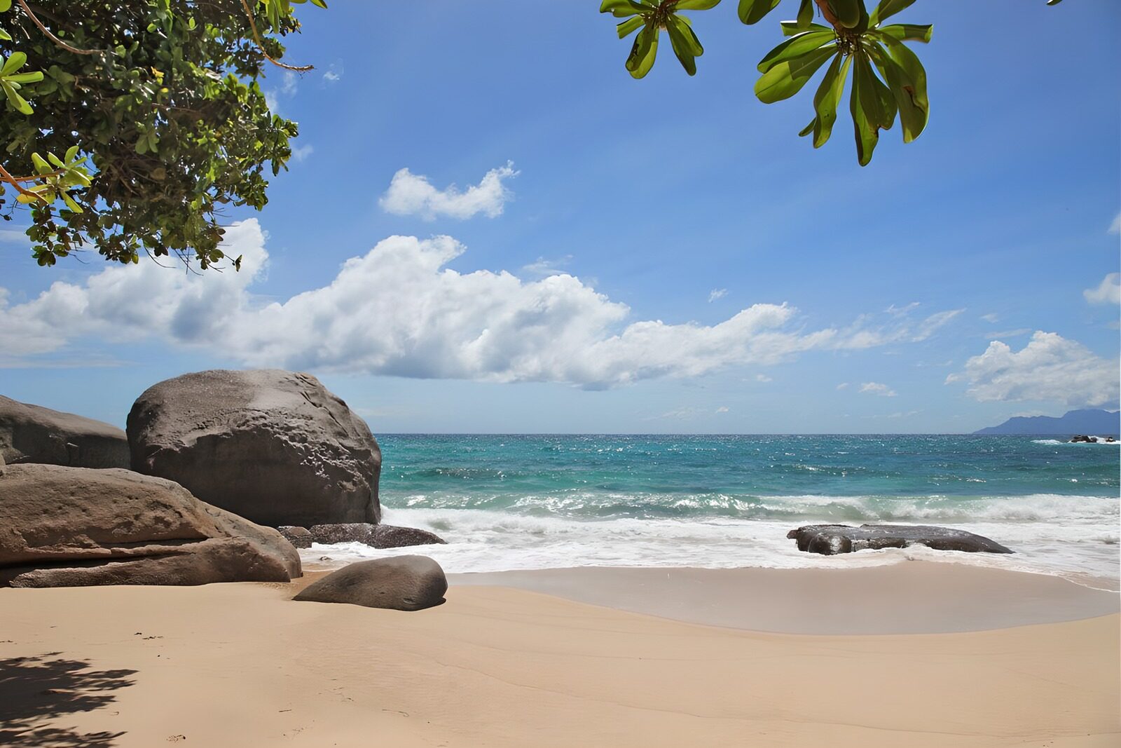 Serene Beach View with Rocky Outcrops