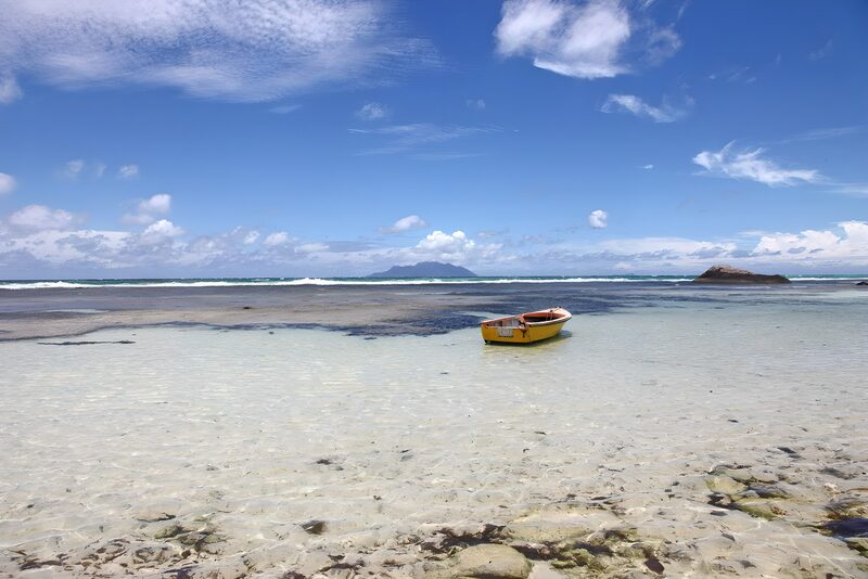 Tranquil Waters with a Yellow Rowboat