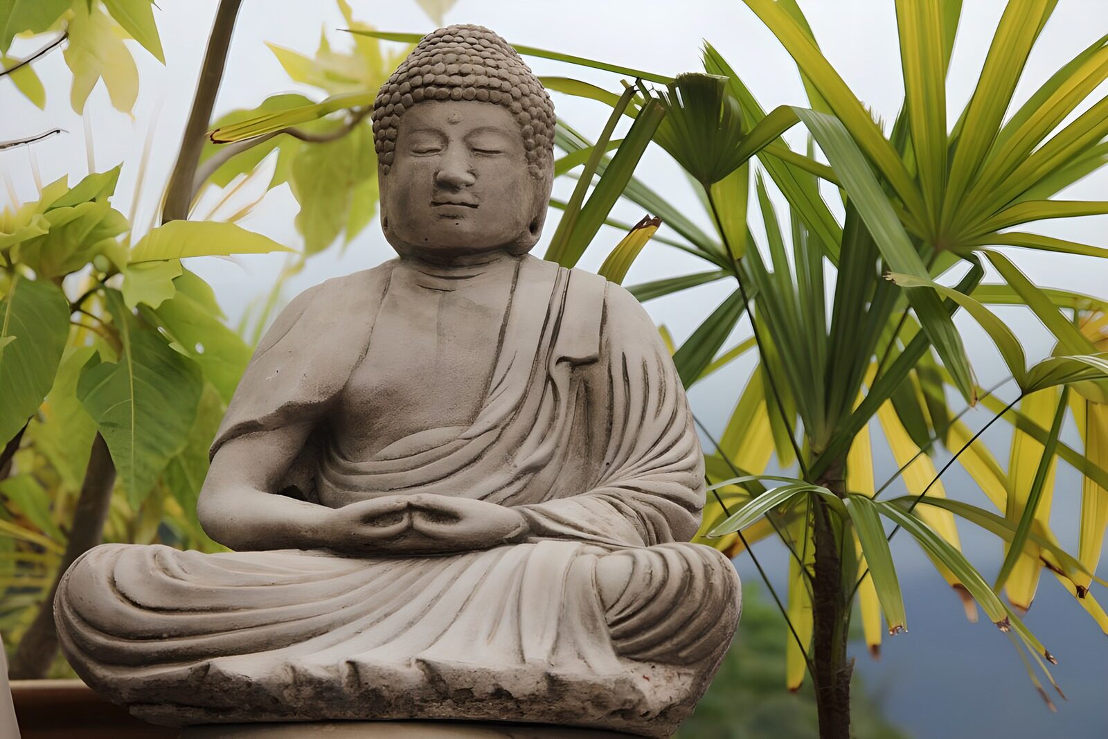 Tranquil Buddha Statue Surrounded by Nature
