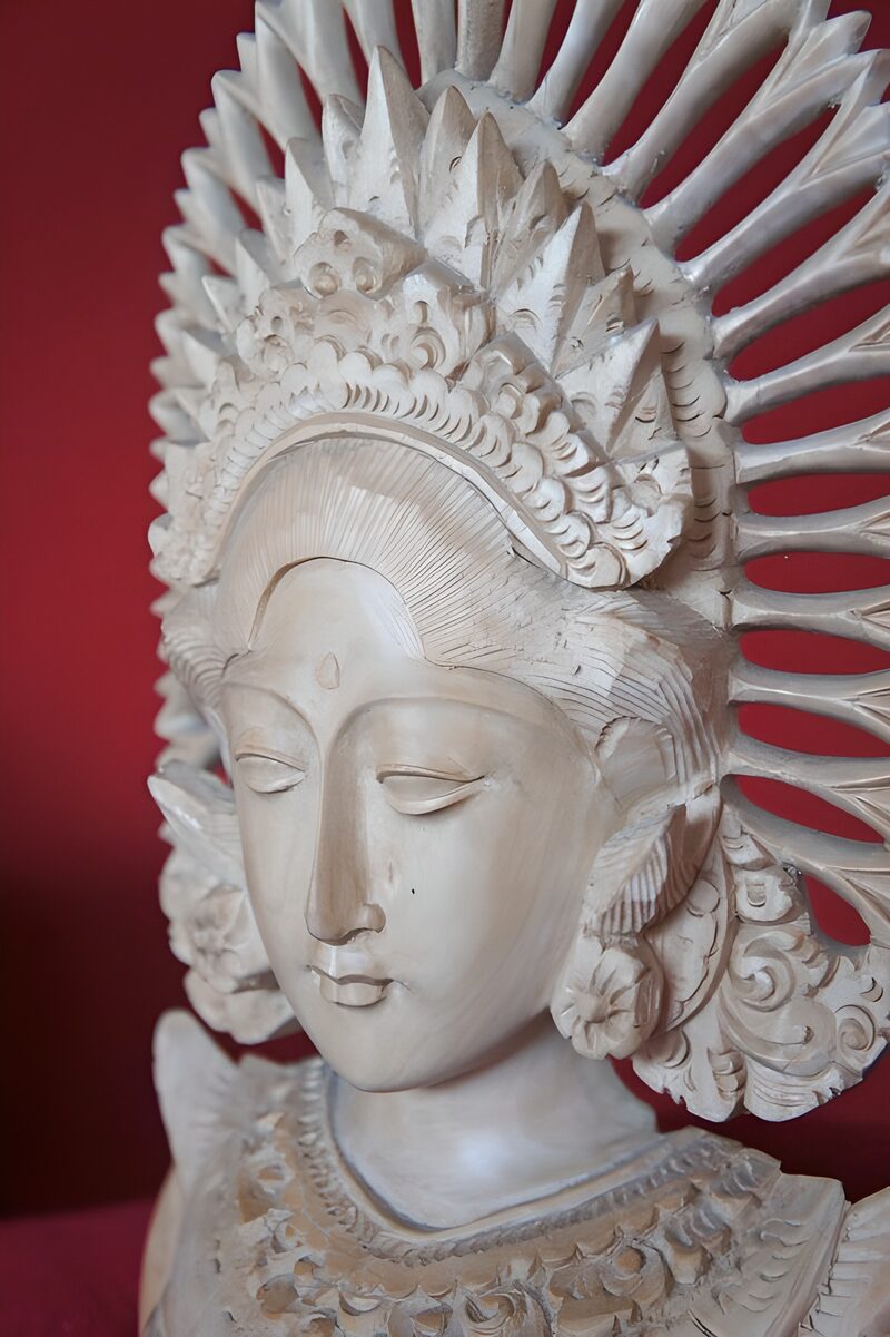 Intricate Wooden Sculpture of a Deity
