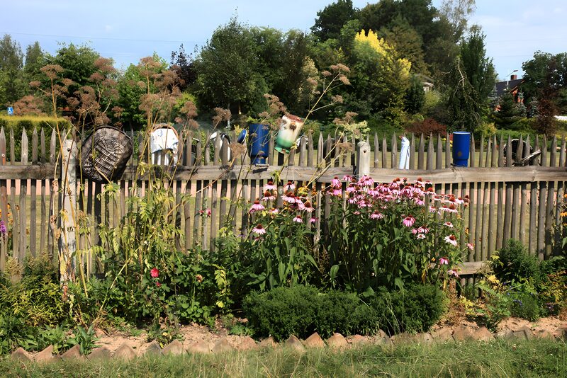 Charming Garden Fence with Colorful Blooms