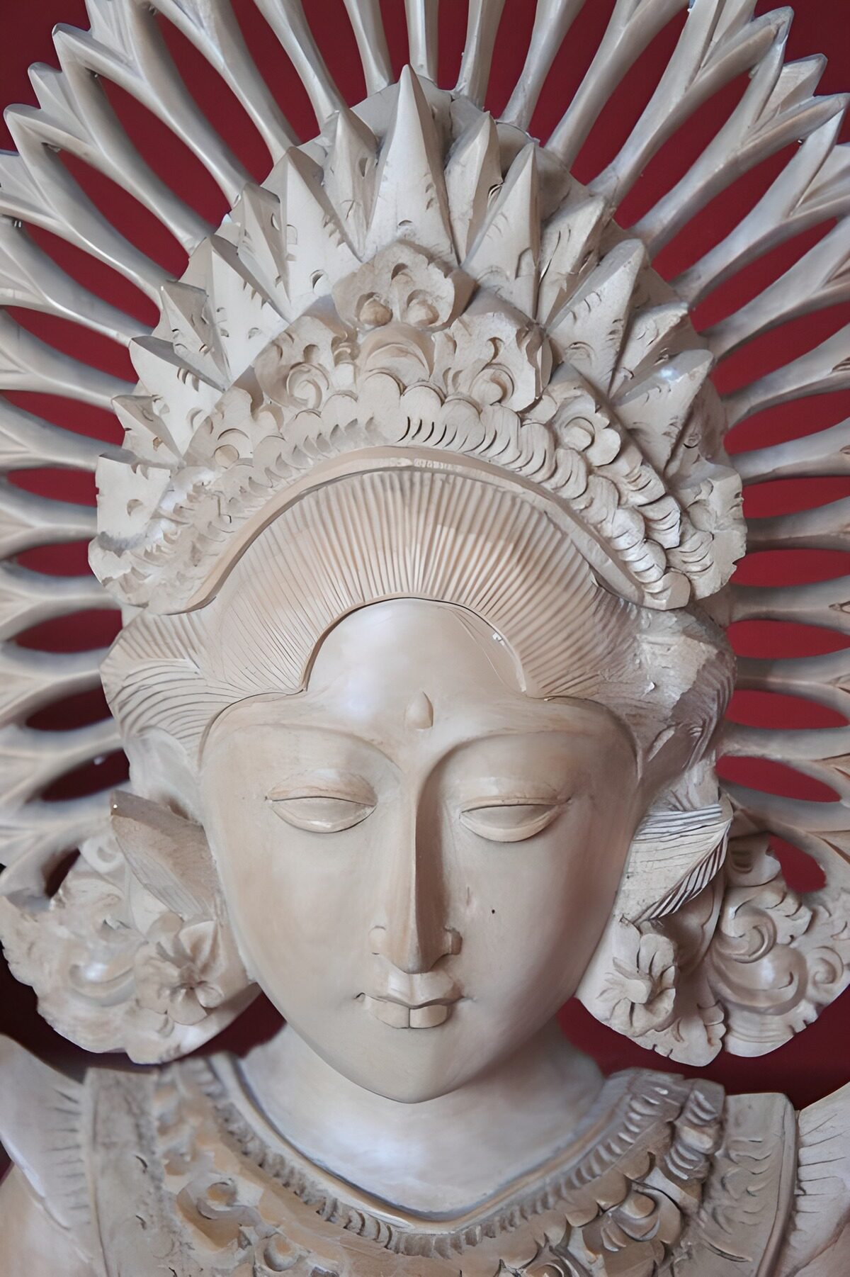 Intricately Carved Wooden Deity Sculpture