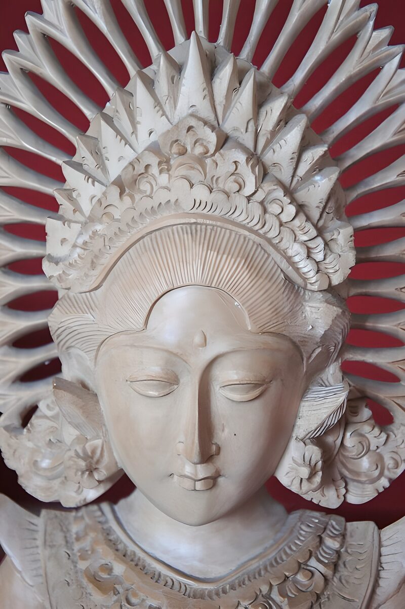 Intricately Carved Wooden Deity Sculpture