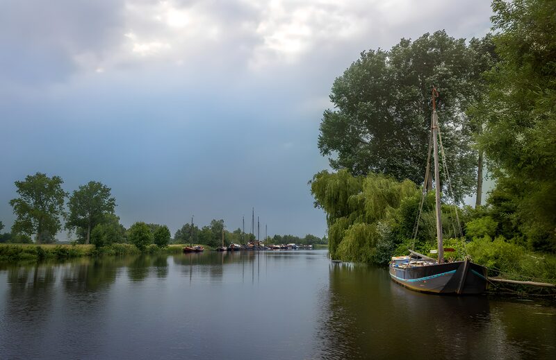 Serene River View with Boats