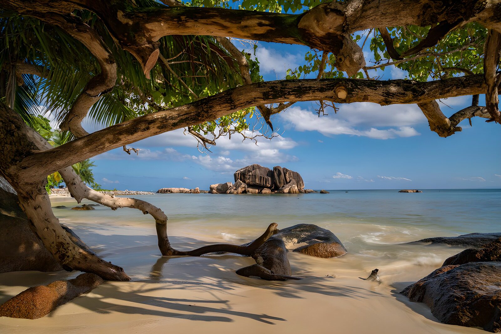 Serene Beach View with Rocky Outcrop