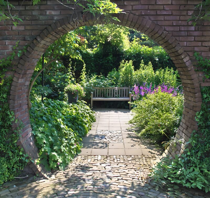 Serene Garden Pathway Through Archway